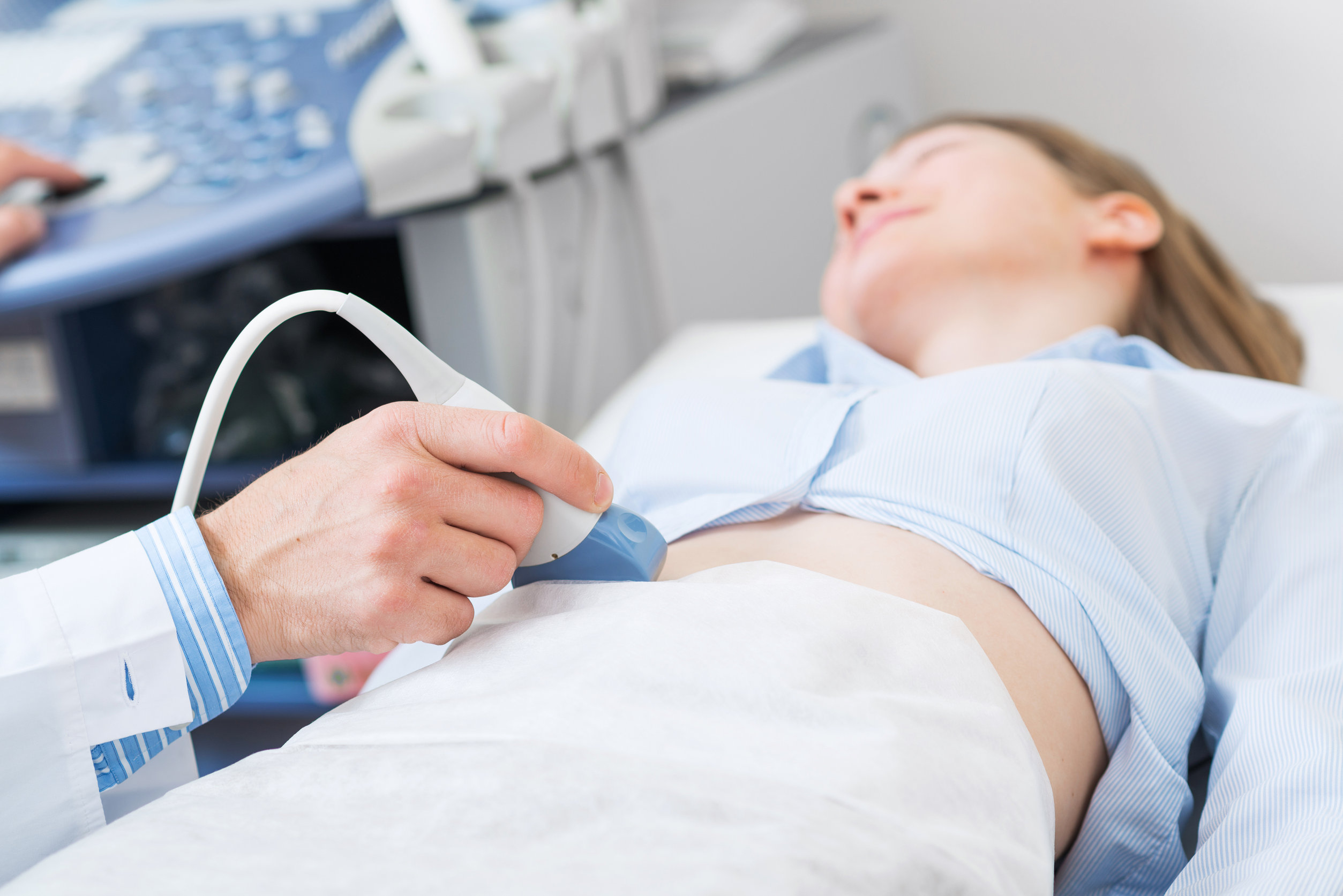 Doctor doing ultrasound screening checkup